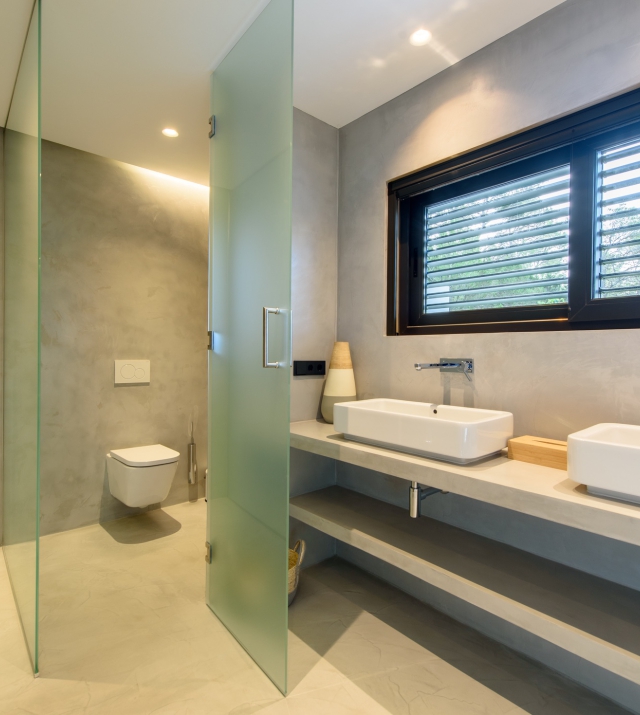 Resa Estates Ibiza villa for sale es Cubells modern heated pool bathroom.jpg